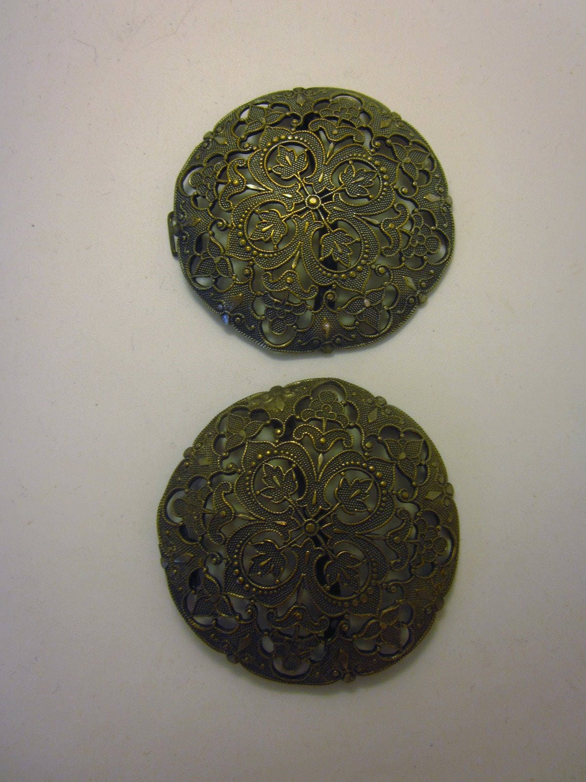 Vintage Heraldic belt buckle with Quatrefoil Oak Leaf Motif