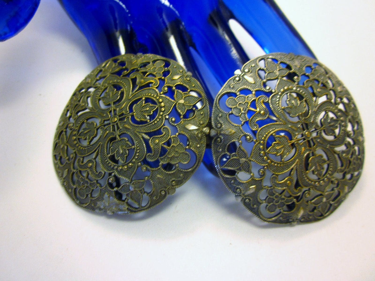 Vintage Heraldic belt buckle with Quatrefoil Oak Leaf Motif