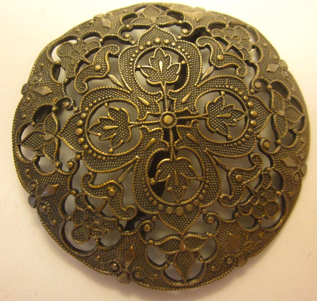 Vintage Heraldic belt buckle with Quatrefoil Oak Leaf Motif