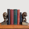 Vintage pair of cast iron base with gilt bronze lions bookends