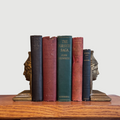 Gilded bronze female face 1920s bookends