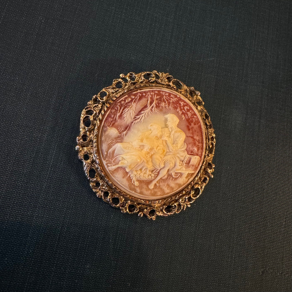 Vintage mid century faux cameo resin brooch with courting scene themed