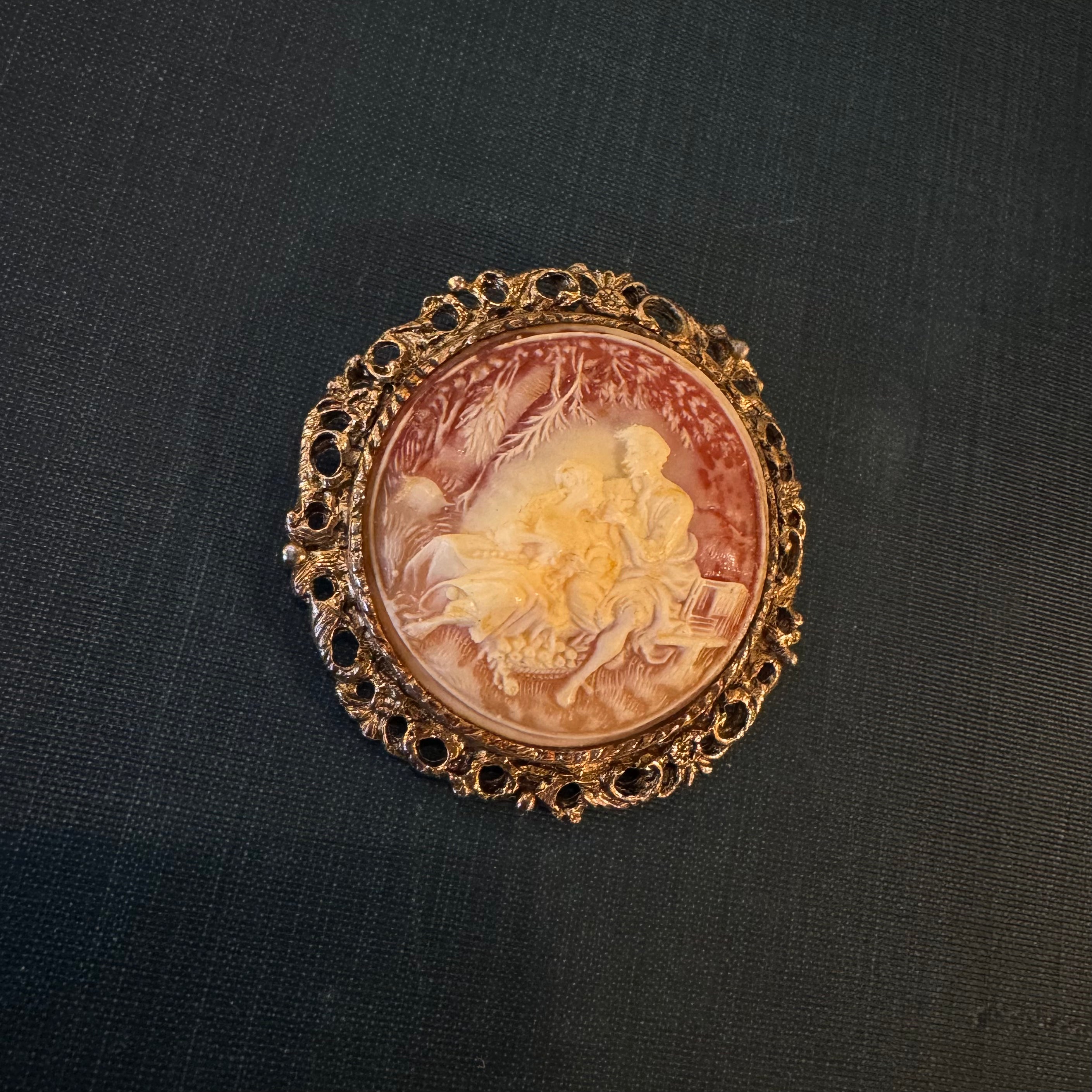 Vintage mid century faux cameo resin brooch with courting scene themed