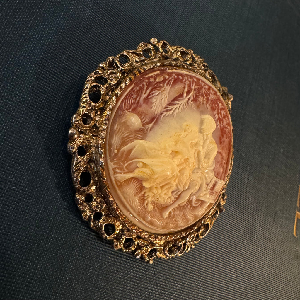 Vintage mid century faux cameo resin brooch with courting scene themed
