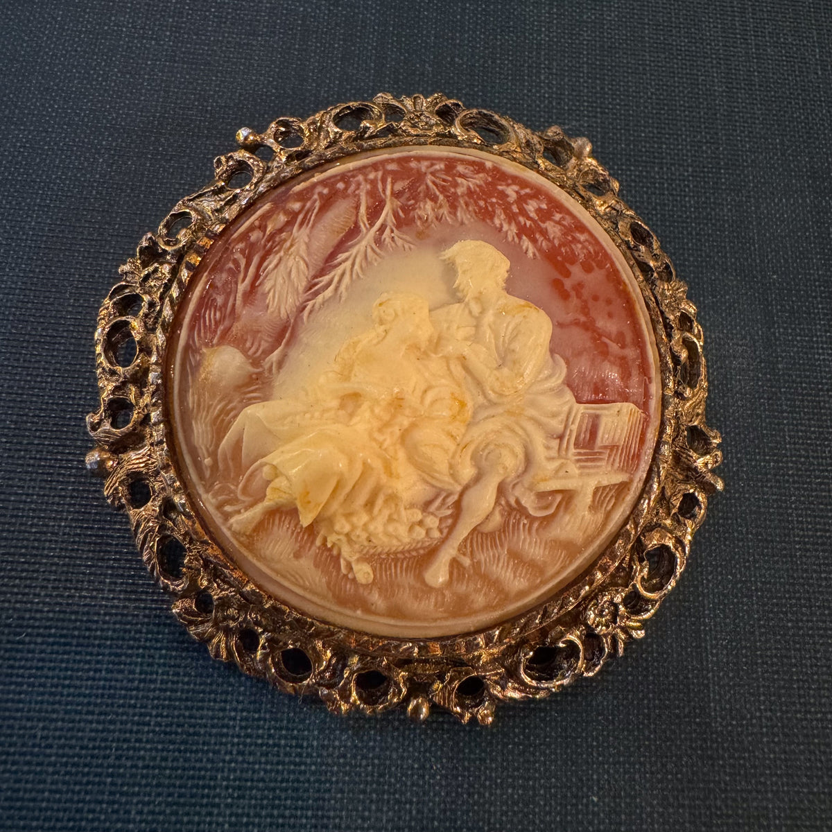 Vintage mid century faux cameo resin brooch with courting scene themed